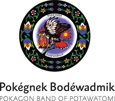 Circular emblem with a floral border and a central bird with outstretched wings holding a flame.